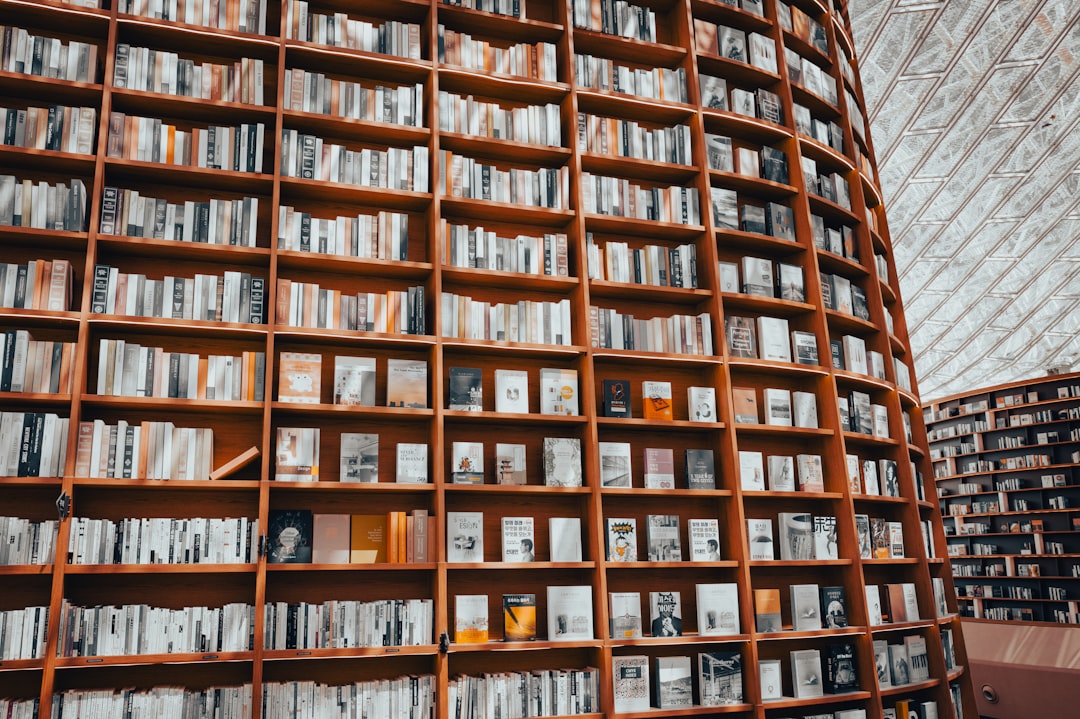 a-large-book-shelf-filled-with-lots-of-books-qyn5clctaeg